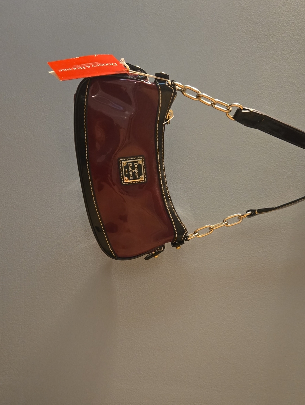 Dooney & Bourke Burgundy Patent Shoulder Bag with Gold Chain Accents